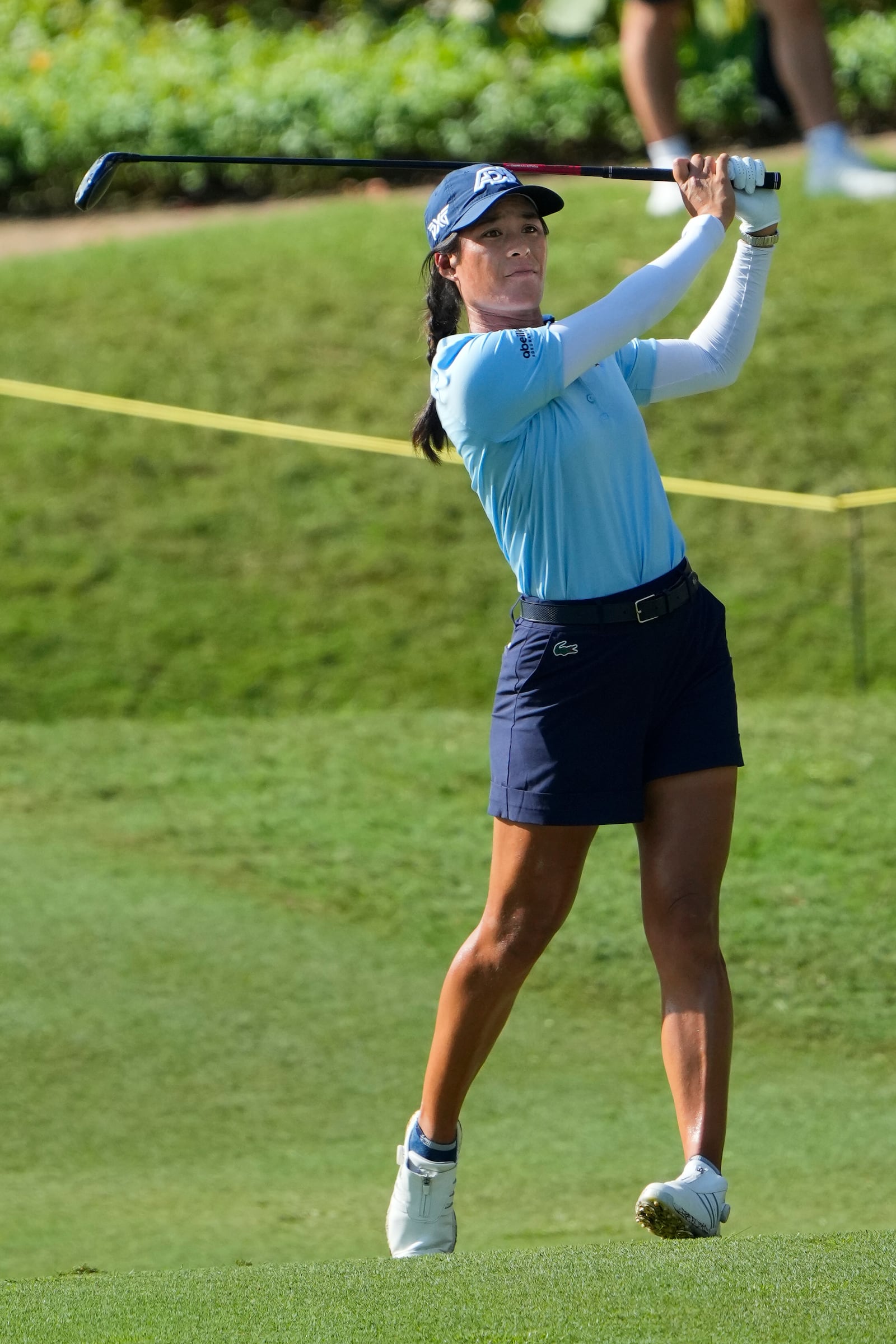 Celine Boutier of France watches her fairway shot on the third hole during the second round of Maybank LPGA Championship golf tournament at Kuala Lumpur Golf and Country club in Kuala Lumpur, Thursday, Oct. 24, 2024. (AP Photo/Vincent Thian)