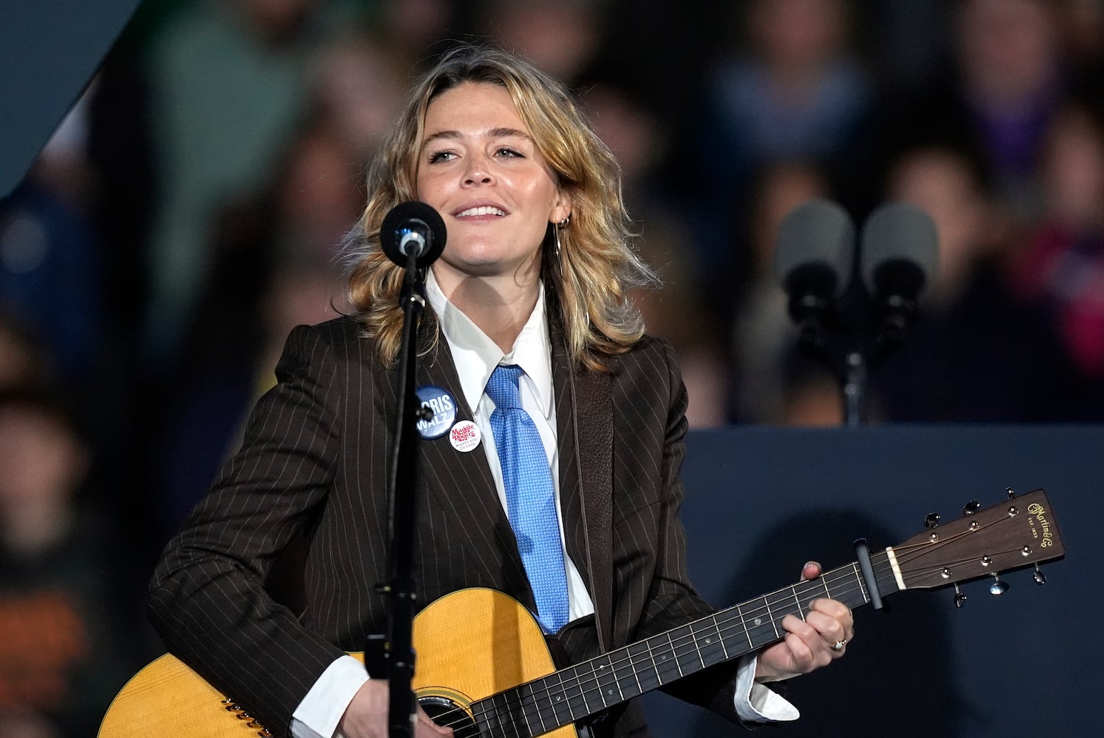 Maggie Rogers performs at a campaign event for Democratic presidential nominee Vice President Kamala Harris in Burns Park Monday, Oct. 28, 2024, in Ann Arbor, Mich. (AP Photo/Carlos Osorio)