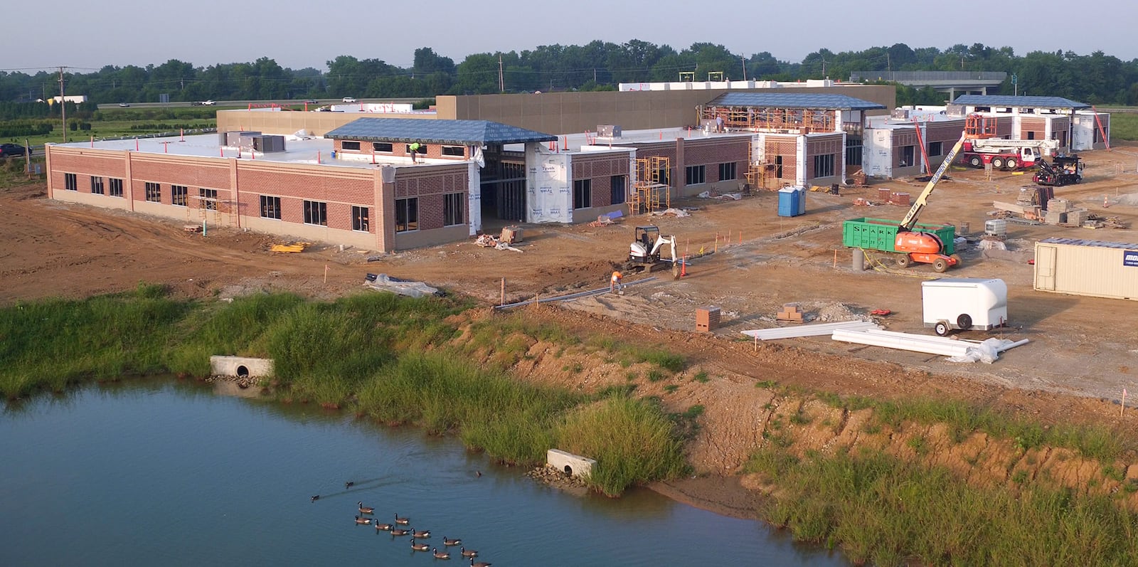 Under construction in Xenia  is The 75,000-square foot REACH Center, a partnership between Xenia, the Greater Dayton YMCA, Clarke State Community College and Central State University.  Much of the exterior has been completed over the summer and the center is expected to open in early 2019.  The REACH Center is located on the west side of Xenia on Progress Drive where commercial development has been steady.  A new Hampton Inn & Suites is opening soon and a Penn Station opened earlier this year to fill out lots near Lowe's and Walmart.   TY GREENLEES / STAFF