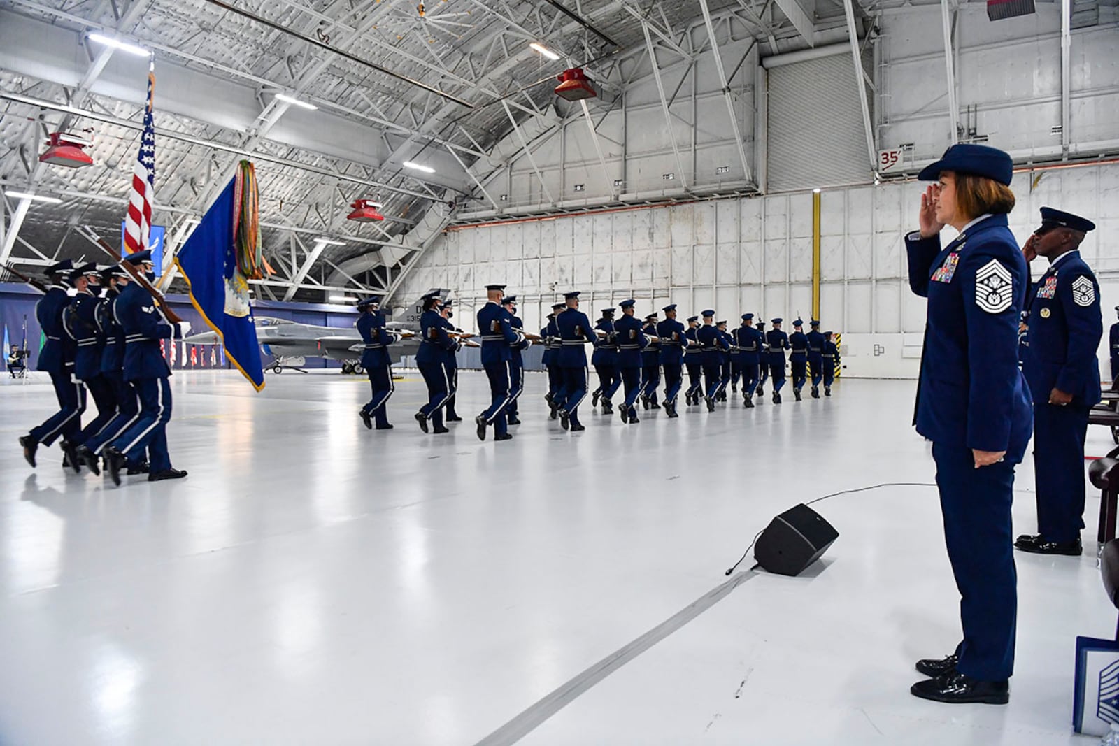 Air Force Chief of Staff Gen. Charles Q. Brown Jr. congratulates Chief Master Sgt. of the Air Force JoAnne S. Bass during the change of responsibility ceremony at Joint Base Andrews, Md., Aug. 14. (U.S. Air Force photo/Andy Morataya)