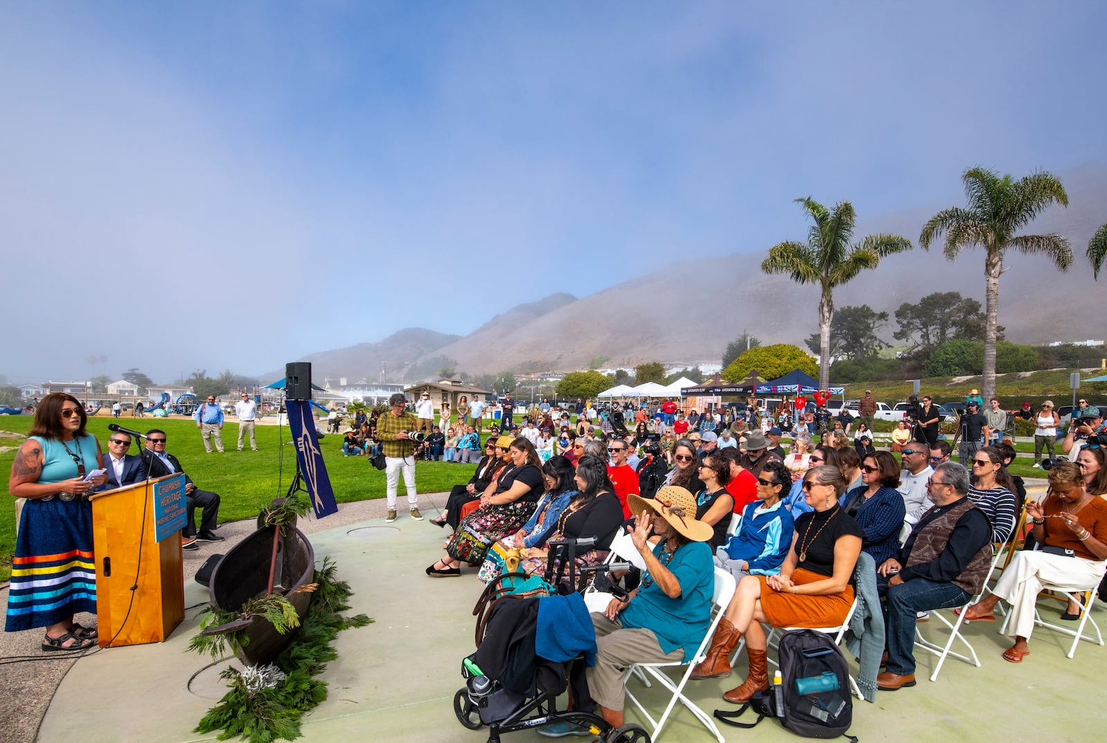 Northern Chumash Tribal Council Chairwoman Violet Sage Walker, left, giving remarks, with California Natural Resources Secretary Wade Crowfoot to her right, and Congressman Salud Carbajal in Pismo Beach, Calif. on Monday, October. 14, 2024. (Robert Schwemmer via AP)