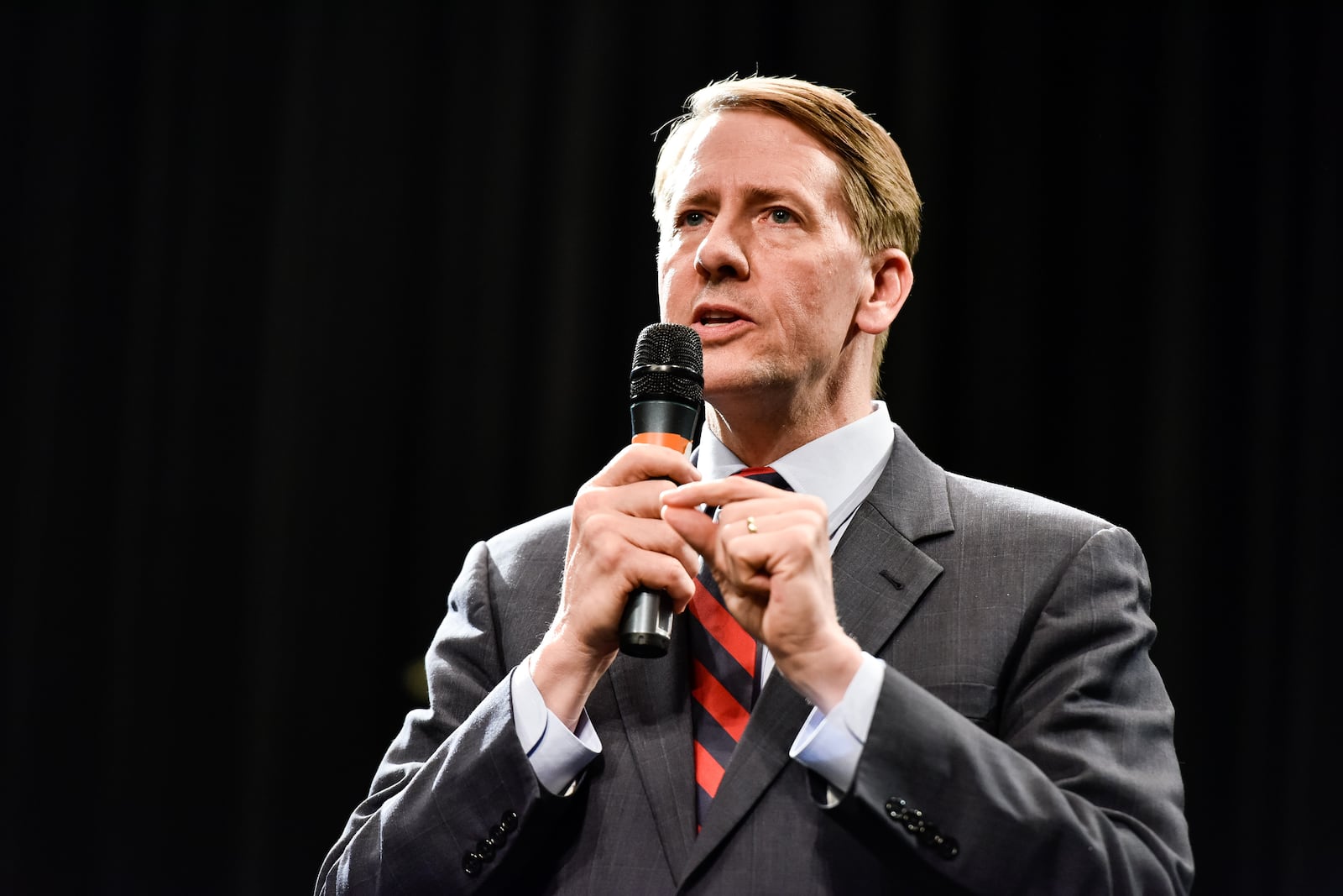 Former Ohio Attorney General Richard Cordray answers a question during The Journal-News and WLWT-TV sponsored Ohio Democratic Party sanctioned debate for governor candidates hosted by Miami University Regionals Tuesday, April 10 at Finkelman Auditorium on the campus of Miami University Middletown. Former Ohio Supreme Court Justice Bill O'Neill, Ohio Senator Joe Schiavoni and former congressman Dennis Kucinich were also in attendance. NICK GRAHAM/JOURNAL-NEWS