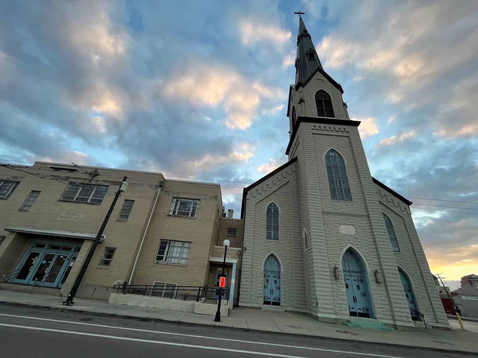 Weyland Ventures, a Kentucky-based developer, wants to turn St. Paul Evangelical Lutheran Church and parish hall at 239 Wayne Ave. in the Oregon District into a new boutique hotel and possibly a restaurant and event space. The developer proposes renovating the church and parish buildings and constructing a new, three-story hotel building just north of the church. CORNELIUS FROLIK / STAFF