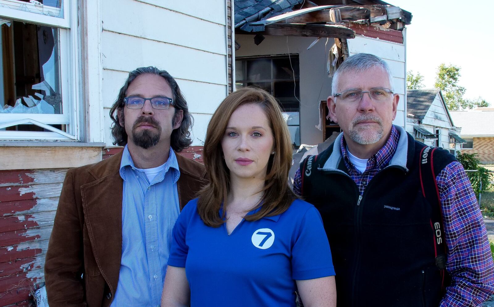 From left, Storm Center 7 Chief Meteorologist McCall Vrydaghs, center, and Dayton Daily News reporters Josh Sweigart, left, and Chris Stewart are retracing tornado-damaged areas of Montgomery County following the path of the most destructive Memorial Day tornado. TODD CARTER / STAFF