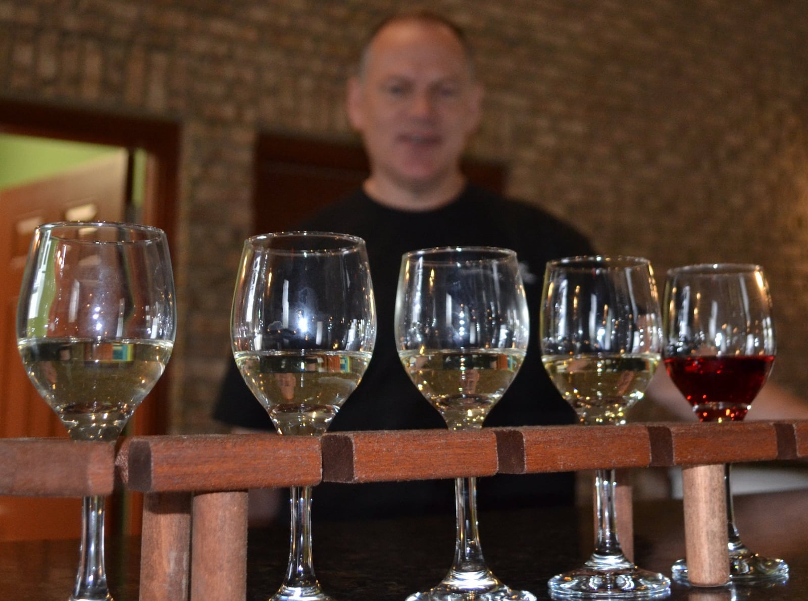 Serving tray of wines for sampling at the Old Mason Winery & Vineyard at 4199 Iddings Road in West Milton. The Miami County winery is the latest addition to the region’s growing winery scene and opened its tasting room to the public this spring. Staff photo by Mark Fisher