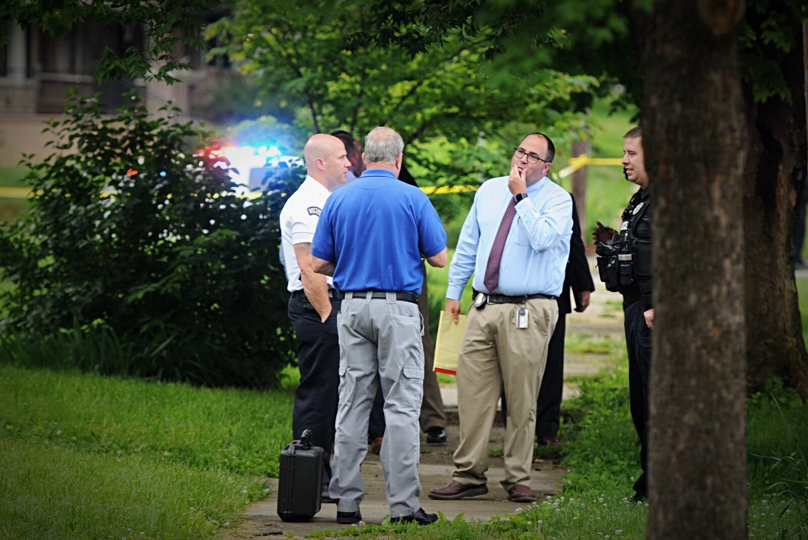 Dayton police are investigating a deadly shooting on Manhattan Avenue. Staff photo by Marshall Gorby.