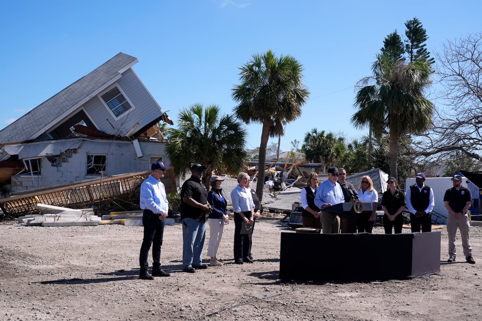 President Joe Biden speaks following a briefing by federal, state, and local officials in St. Pete Beach, Fla., during a tour of areas affected by Hurricane Milton, Sunday, Oct. 13, 2024. (AP Photo/Manuel Balce Ceneta)