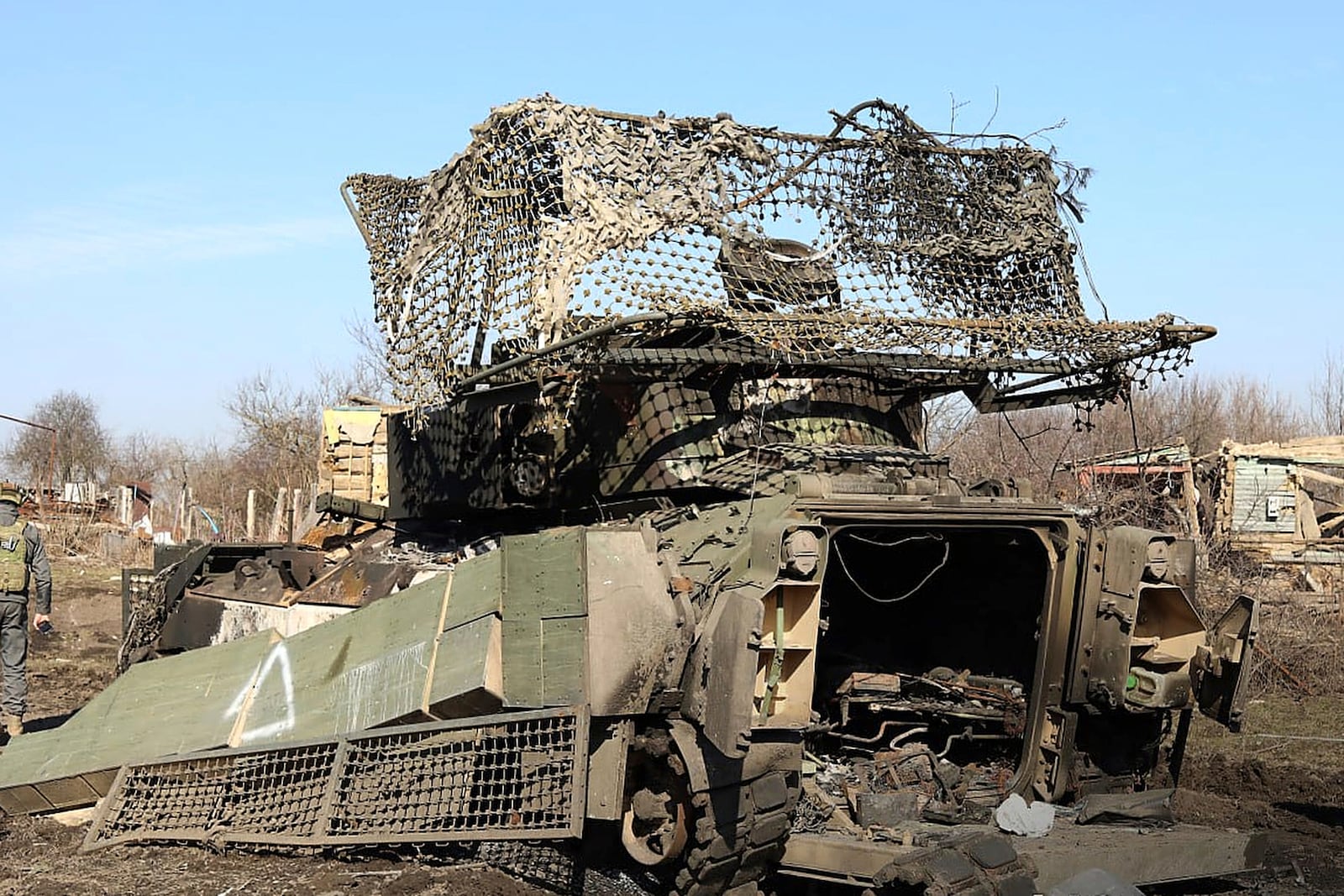 In this photo distributed by Russian Defense Ministry Press Service on Saturday, March 15, 2025, a destroyed Ukrainian Army M2A Bradly armored personal carrier is seen at Cherkasskoe Porechnoe and Pravda in Sudzha district of the Kursk region of Russia after it was taken over by Russian troops. (Russian Defense Ministry Press Service via AP)