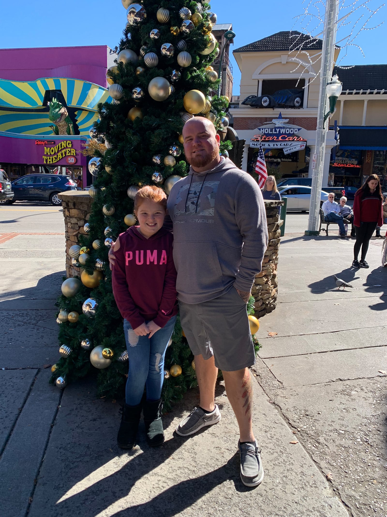 Hope Reger's son, Brian Mickle, remains close to his mother after losing his younger brother, Justin, in a fatal shooting. He is shown with daughter Haylynn Mickle. CONTRIBUTED