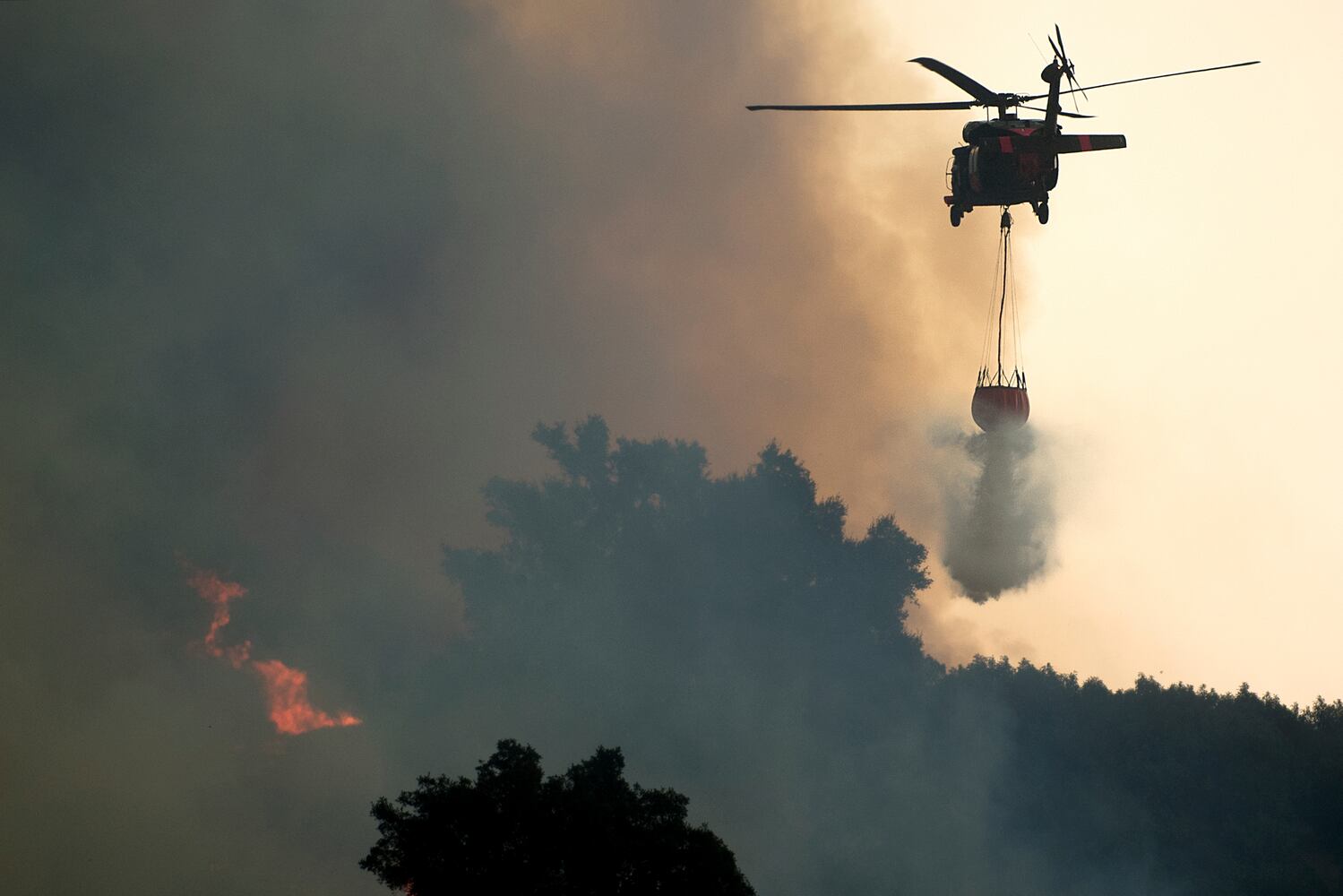 Photos: California wildfires burn thousands of acres, force evacuations