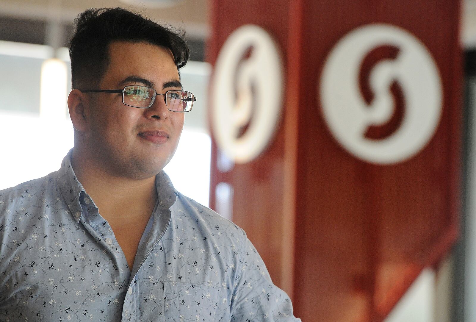 Miguel Andrade lost his restaurant management job during the pandemic and has returned to Sinclair to get his third college degree to expand his opportunities. MARSHALL GORBY\STAFF