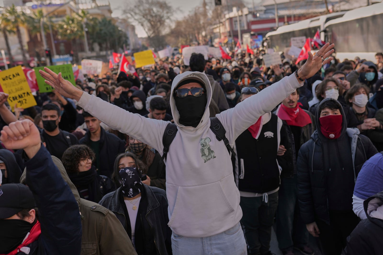 University students shout slogans in Istanbul, Turkey, Friday, March 21, 2025, as they protest against the arrest of Istanbul's Mayor Ekrem Imamoglu. (AP Photo/Francisco Seco)