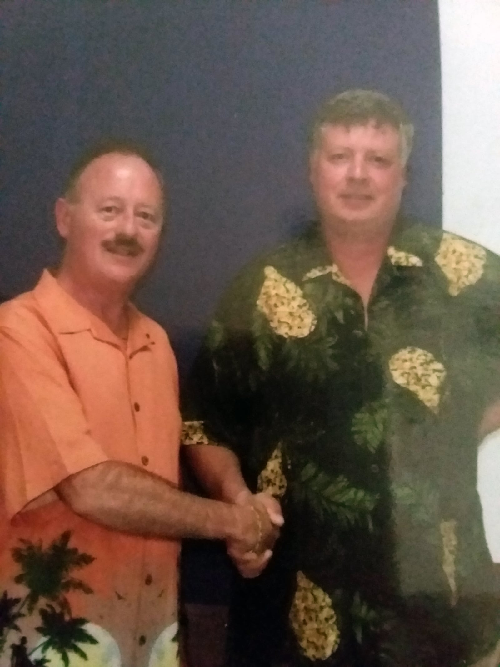 Smith consulted different author friends about his writing and many convinced him to try something new. Romance novels have always had a large following. He is shown with author friend Tim Dorsey (L) at Key Largo Authorfest in 2012.