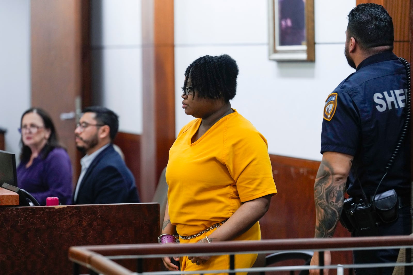 Gloria Williams, who has several charges related to the 2020 death of her son, Kendrick Lee, walks into the courtroom on Tuesday, Nov. 12, 2024, at the Harris County Criminal Justice Center in Houston. (Brett Coomer/Houston Chronicle via AP)