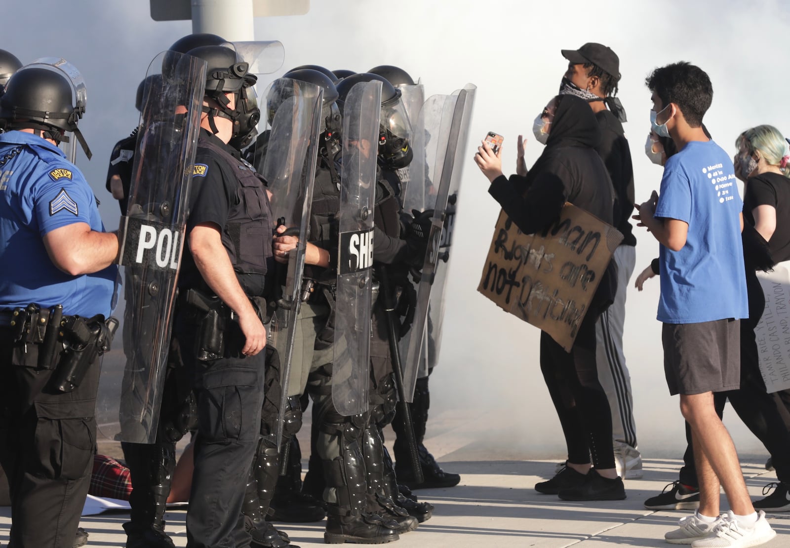 Protesters in downtown Dayton. BILL LACKEY\STAFF