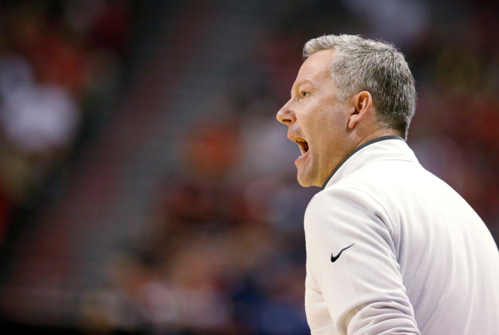 Utah State coach Ryan Odom calls out to players during the first half of the team's NCAA college basketball game against San Diego State for the men's Mountain West Tournament championship Saturday, March 11, 2023, in Las Vegas. (AP Photo/Steve Marcus)