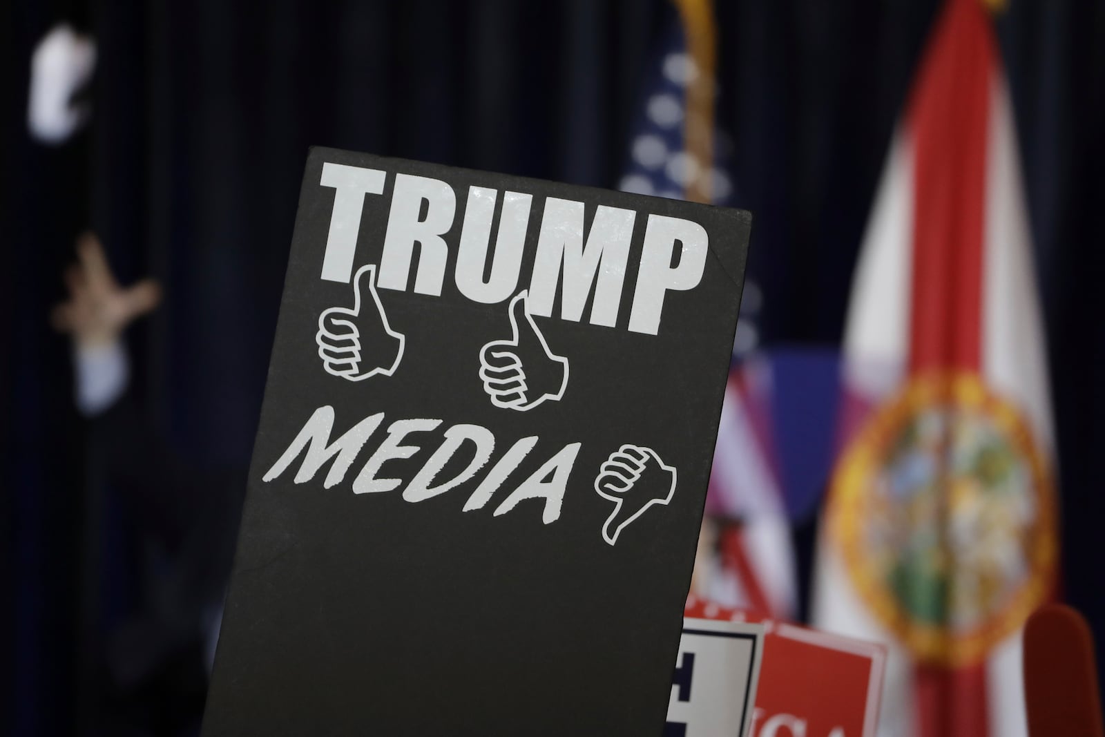 FILE - Campaign signs before a speech by Republican presidential candidate Donald Trump Saturday, Nov. 5, 2016, in Tampa, Fla. (AP Photo/Chris O'Meara, File)