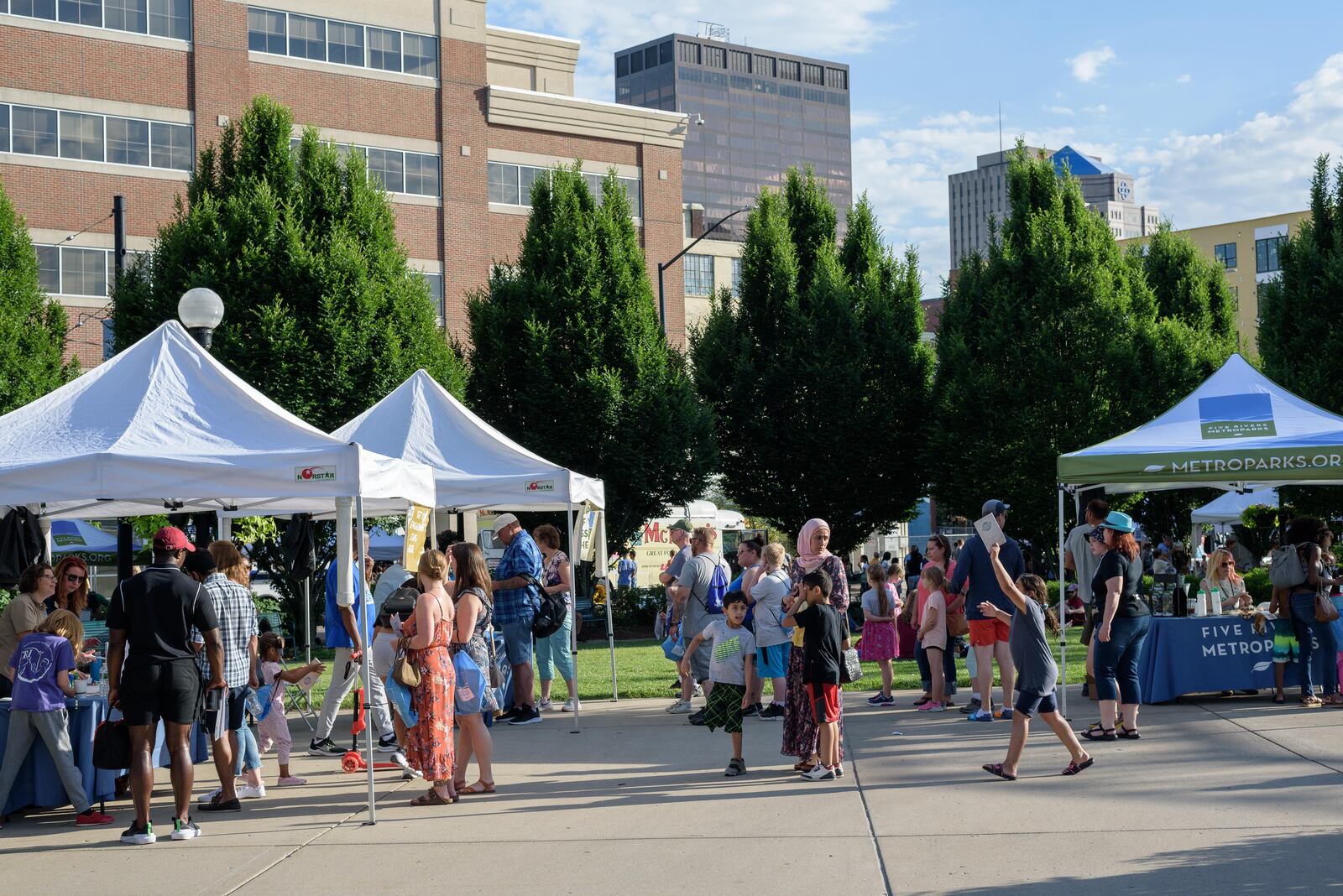 Passport to MetroParks was held at RiverScape MetroPark in downtown Dayton on Friday, June 3, 2022. The event, looking ahead to all that MetroParks will offer this summer, included live music, food trucks, craft beer and family-friendly games and activities. TOM GILLIAM / CONTRIBUTING PHOTOGRAPHER