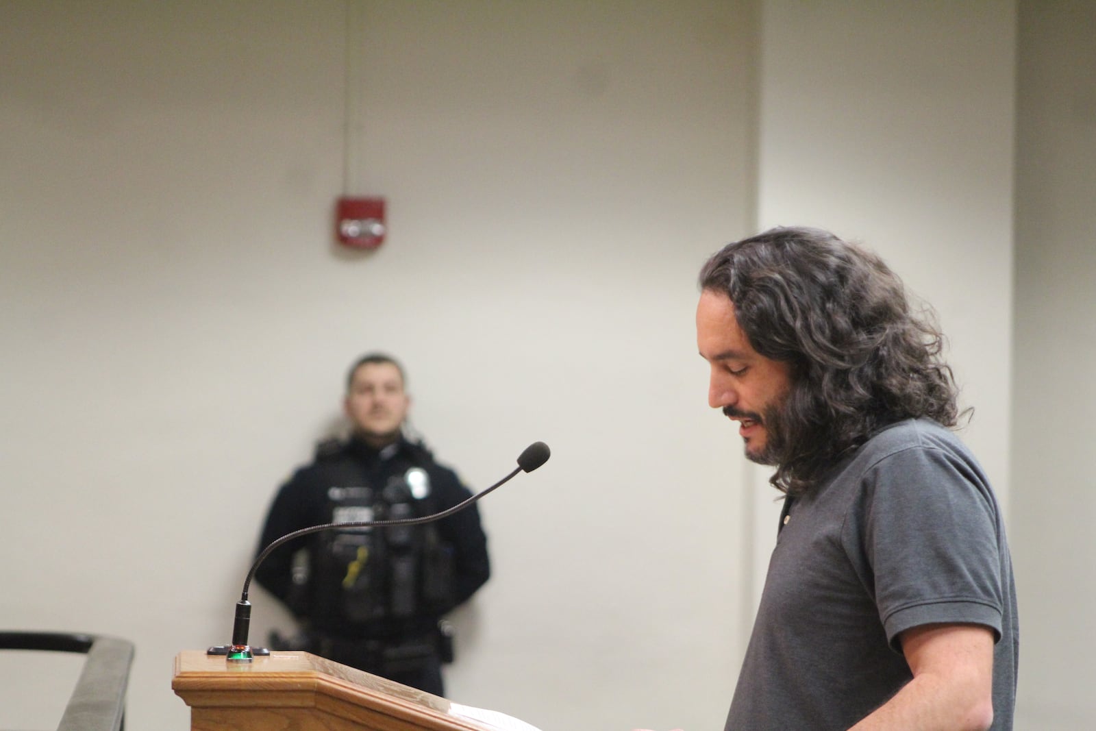 Julio Mateo, a local resident who was involved in the Dayton police reform process, speaks at a Dayton City Commission meeting on Nov. 1, 2023. He and other community members called on the city to host a public meeting to provide an update about ongoing police reform activities and efforts. CORNELIUS FROLIK / STAFF