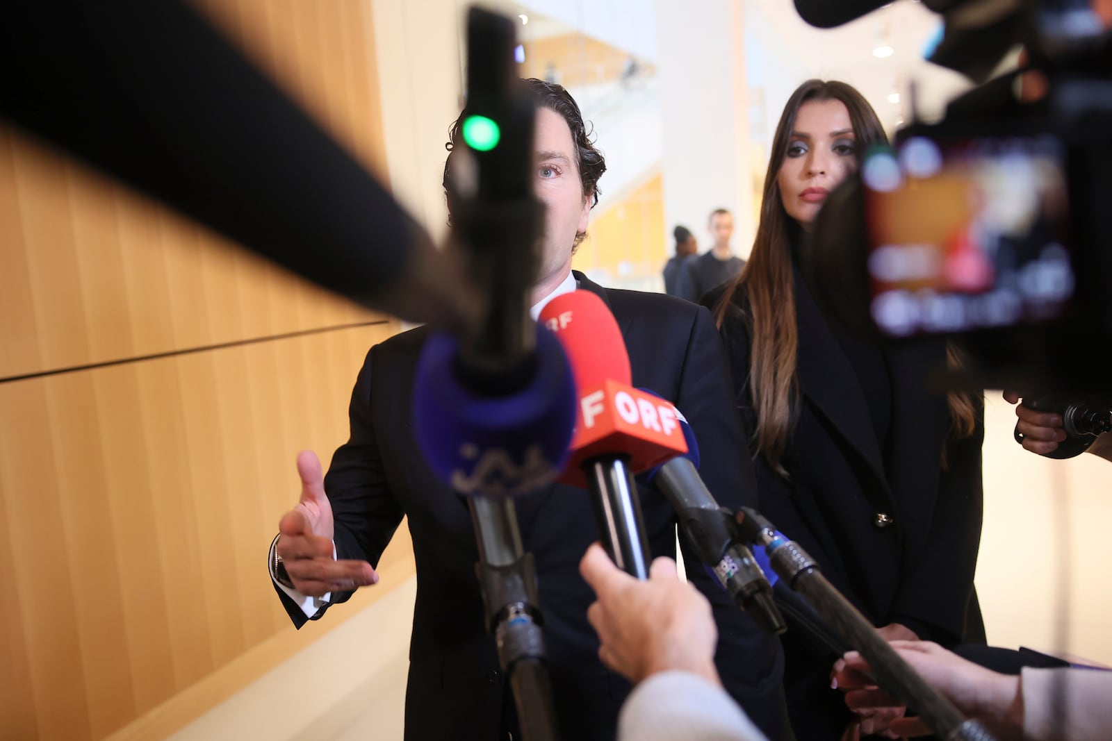 Jeremie Assous, the lawyer for French actor Gerard Depardieu, answers reporters as he arrives at the courtroom while Depardieu, who is facing trial for the alleged sexual assaults of two women on a film set in 2021, won't appear before a criminal court, Monday, Oct. 28, 2024 in Paris. (AP Photo/Thomas Padilla)