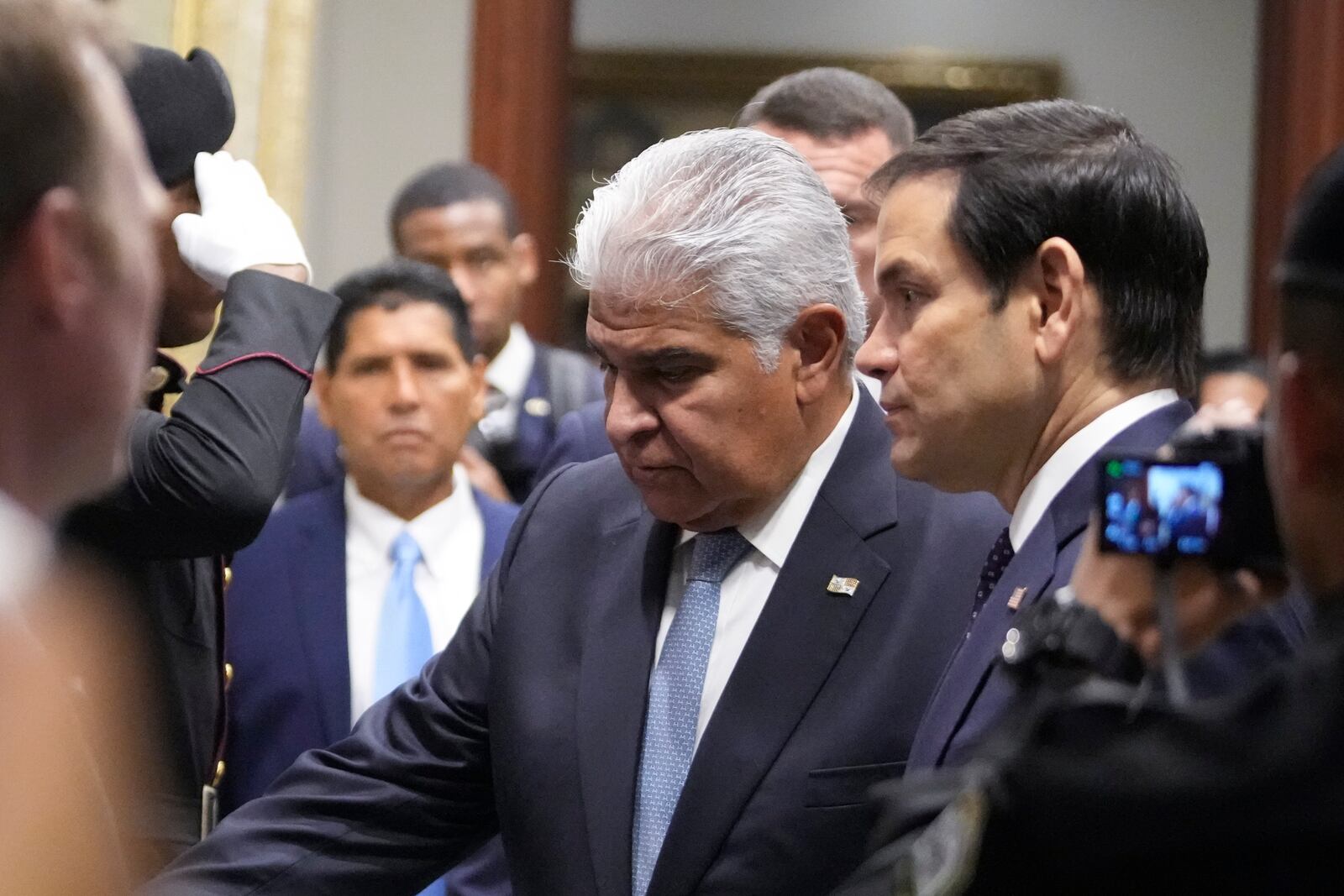 Panama's President Jose Mulino, left, and U.S. Secretary of State Marco Rubio arrive for a meeting at presidential palace in Panama City, Sunday, Feb. 2, 2025. (AP Photo/Mark Schiefelbein, Pool)