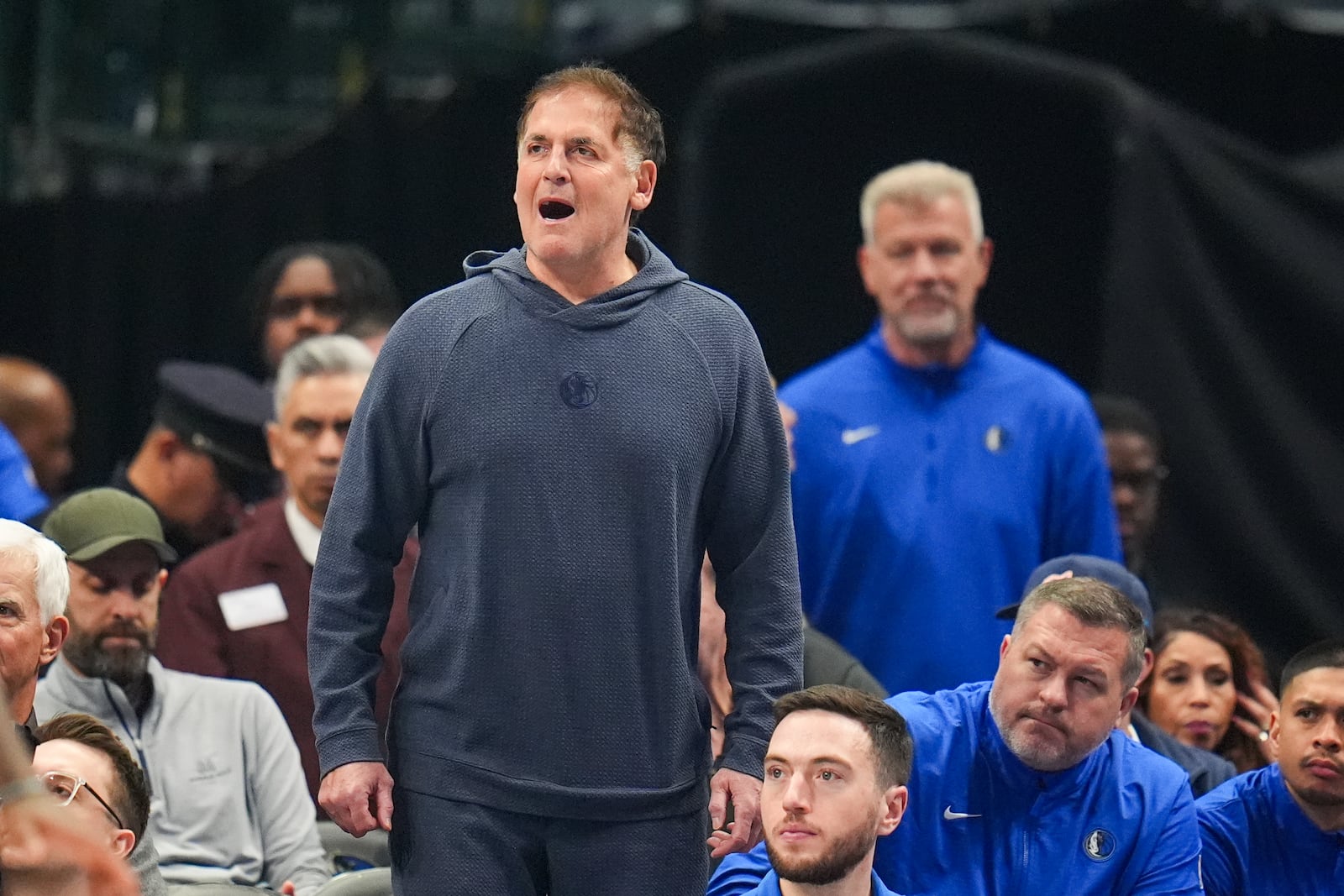 Mark Cuban reacts during the first half of an NBA basketball game between the Dallas Mavericks and the Miami Heat Thursday, Feb. 13, 2025, in Dallas. (AP Photo/Julio Cortez)