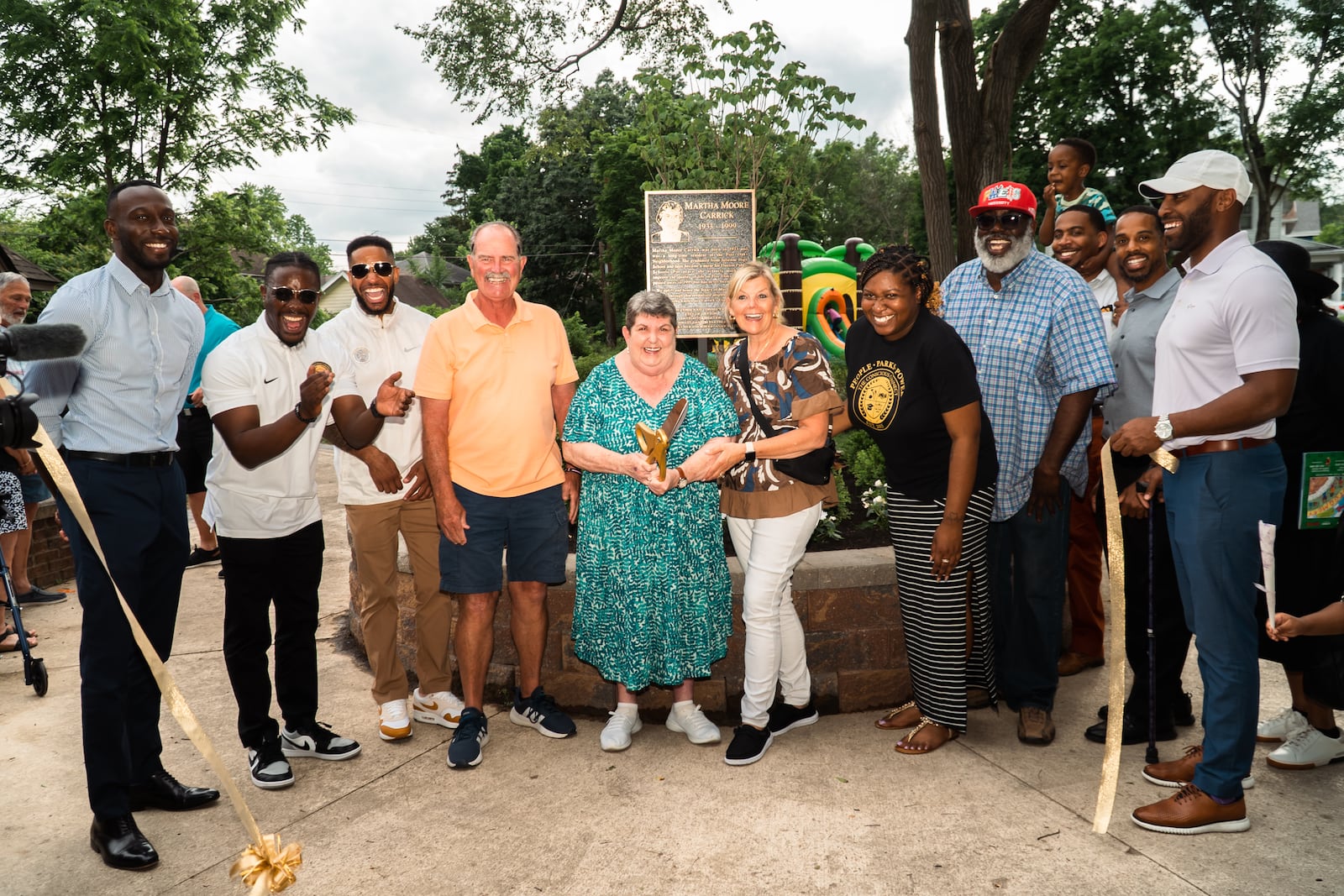 A ribbon-cutting for Carrick’s Corner Pocket Park at 300 Delaware Ave. in Dayton's Five Oaks neighborhood. The park is named after Martha Moore Carrick, who lived in Dayton for more than 50 years. She was the president and co-founder of the Five Oaks Neighborhood Improvement Association. Her family members attended the ribbon-cutting. PHOTO CONTRIBUTED BY Love'Yah Stewart.