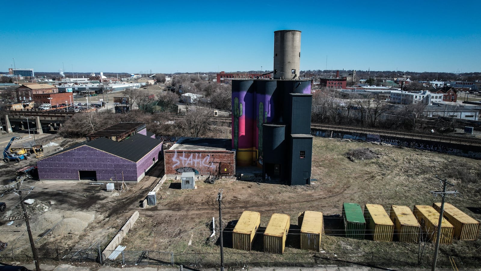 Wes Hartshorn and his two friends/business partners, Shannon Thomas and Scott Johnson, are in the midst of redeveloping 1.5 acres near 2nd Street Market in downtown Dayton into The Silos, a food hall and beer garden with 13,000-square-feet of outdoor space. JIM NOELKER/STAFF