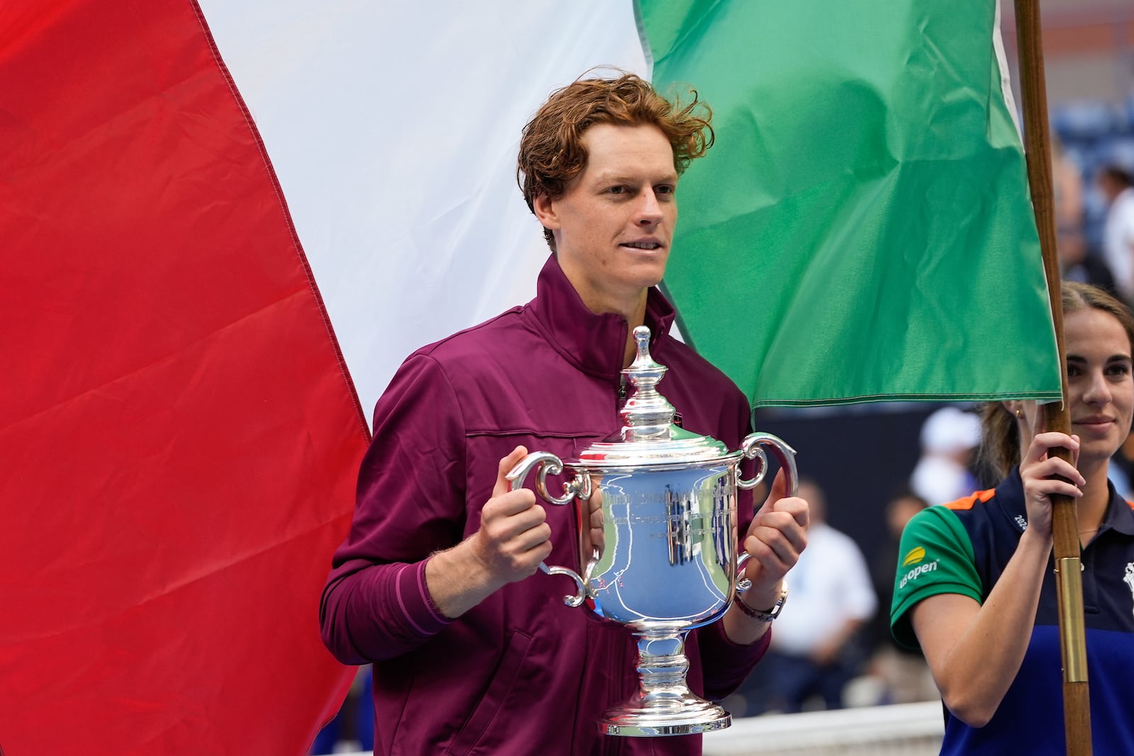 FILE - Jannik Sinner, of Italy, holds up the championship trophy after defeating Taylor Fritz, of the United States, in the men's singles final of the U.S. Open tennis championships, Sunday, Sept. 8, 2024, in New York. (AP Photo/Julia Nikhinson, File)