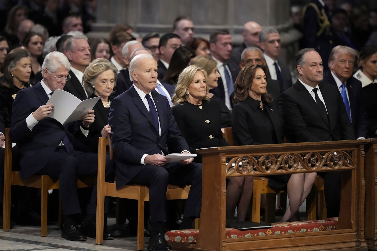 President Joe Biden, first lady Jill Biden, Vice President Kamala Harris, second gentleman Doug Emhoff, former President Bill Clinton, former first lady Hillary Clinton, former President George W.Bush, former first lady Laura Bush, former President Barack Obama, former President and President-elect Donald Trump, former first lady Melania Trump, former Vice President Al Gore former Vice President Mike Pence and others, attend the State Funeral for former President Jimmy Carter at Washington National Cathedral in Washington, Thursday, Jan. 9, 2025. (AP Photo/Ben Curtis)