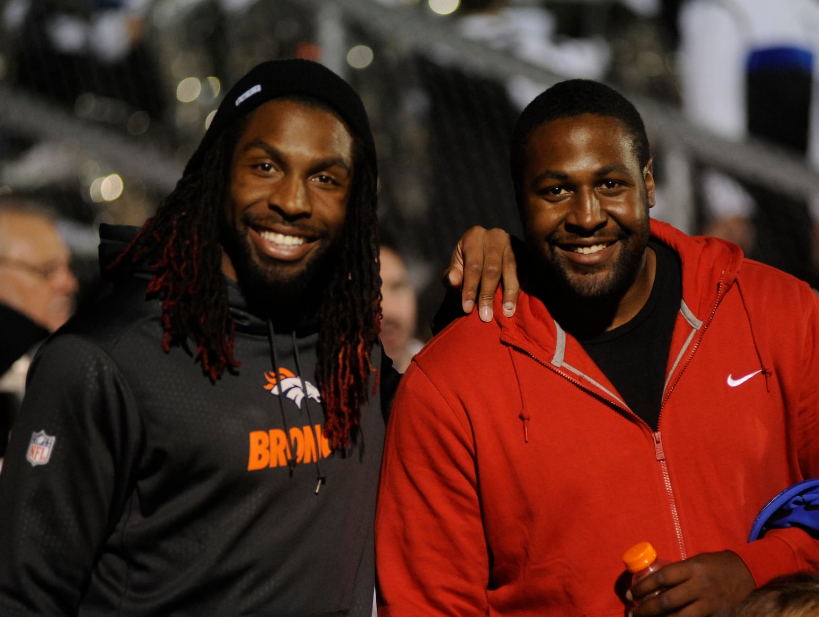 Brothers and Miamisburg grads David (Broncos) and Ken Bruton watch the game. Miamisburg hosted Springboro in the final high school football game at Harmon Field on Friday, Oct. 23, 2015. MARC PENDLETON / STAFF