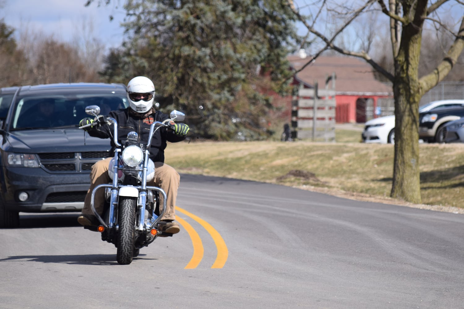 PHOTOS: Thousands of Outlaws attend motorcycle gang leaders funeral at Montgomery County Fairgrounds.