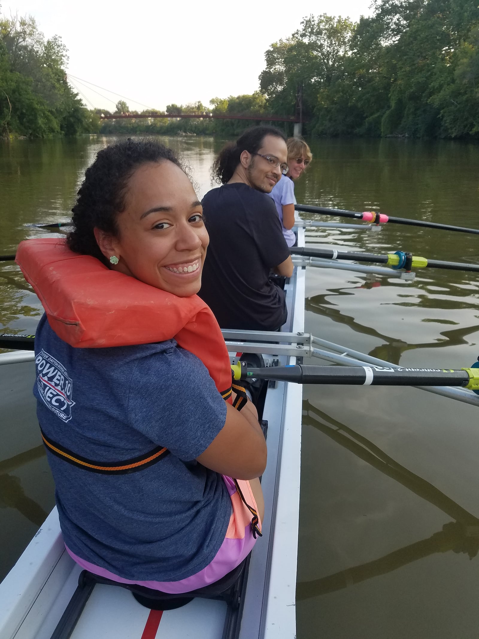 Meg Evans (front of boat) and her husband Brian White, have two children. Now grown, Tara Hux (front of photo) and Brandon White (center) enjoy rowing with their parents. CONTRIBUTED