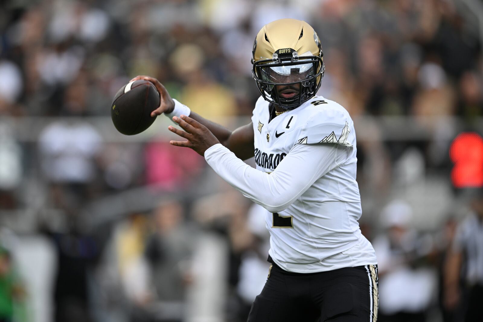 FILE - Colorado quarterback Shedeur Sanders (2) throws a pass against Central Florida during the first half of an NCAA college football game, Saturday, Sept. 28, 2024, in Orlando, Fla. (AP Photo/Phelan M. Ebenhack, File)