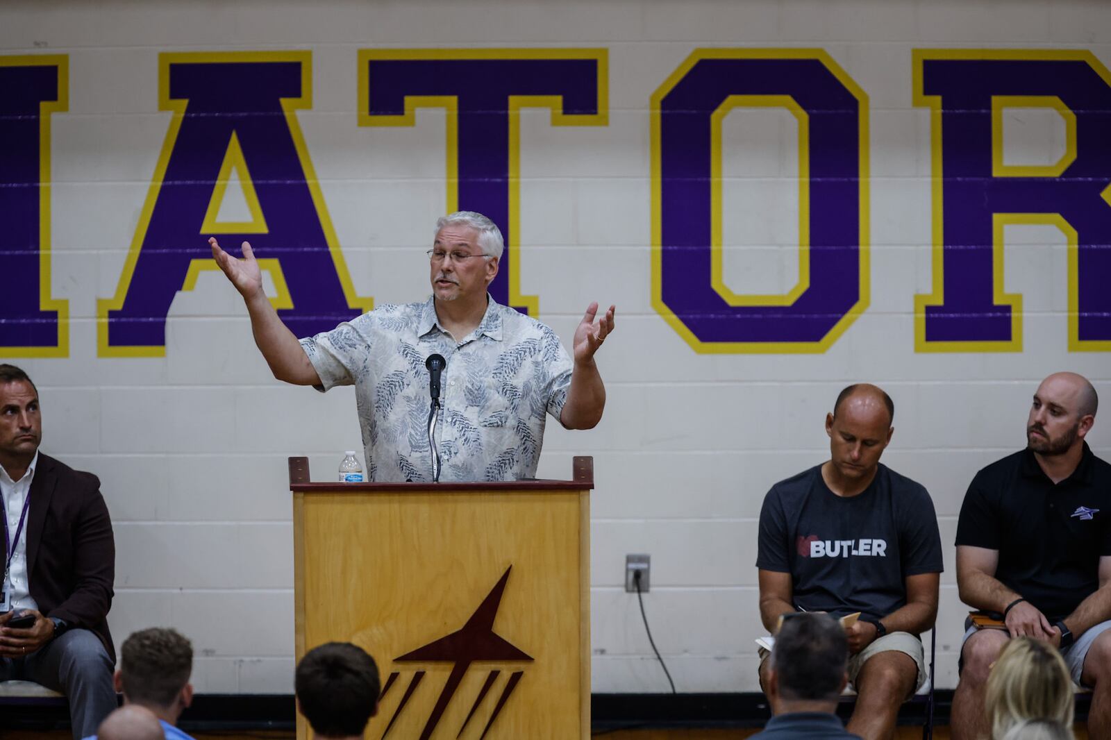 Kelly Brockman, whose daughter, Sarah Anderson, and granddaughter Kayla Anderson, were two of the four victims shot Friday in Butler Twp., addresses the crowd gathered for a vigil Monday, Aug. 8, 2022, at Butler High School. JIM NOELKER/STAFF