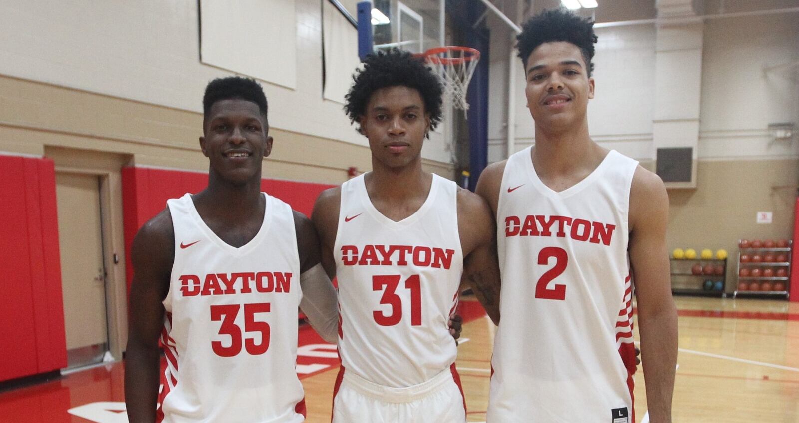 Dayton’s Dwayne Cohill, Jhery Matos and Frankie Policelli pose for a photo on Wednesday, Oct. 18, 2018, at the Cronin Center. David Jablonski/Staff