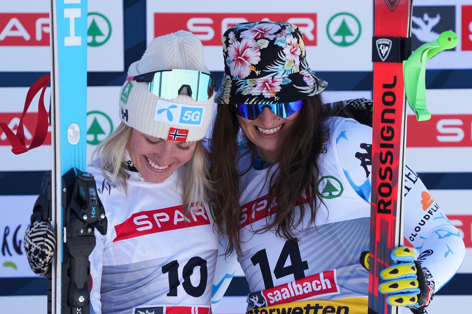 Norway's Kajsa Vickhoff Lie celebrates on the podium after taking joint third place with United States' Lauren Macuga, right, in a women's Super-G, at the Alpine Ski World Championships, in Saalbach-Hinterglemm, Austria, Thursday, Feb. 6, 2025. (AP Photo/Giovanni Auletta)