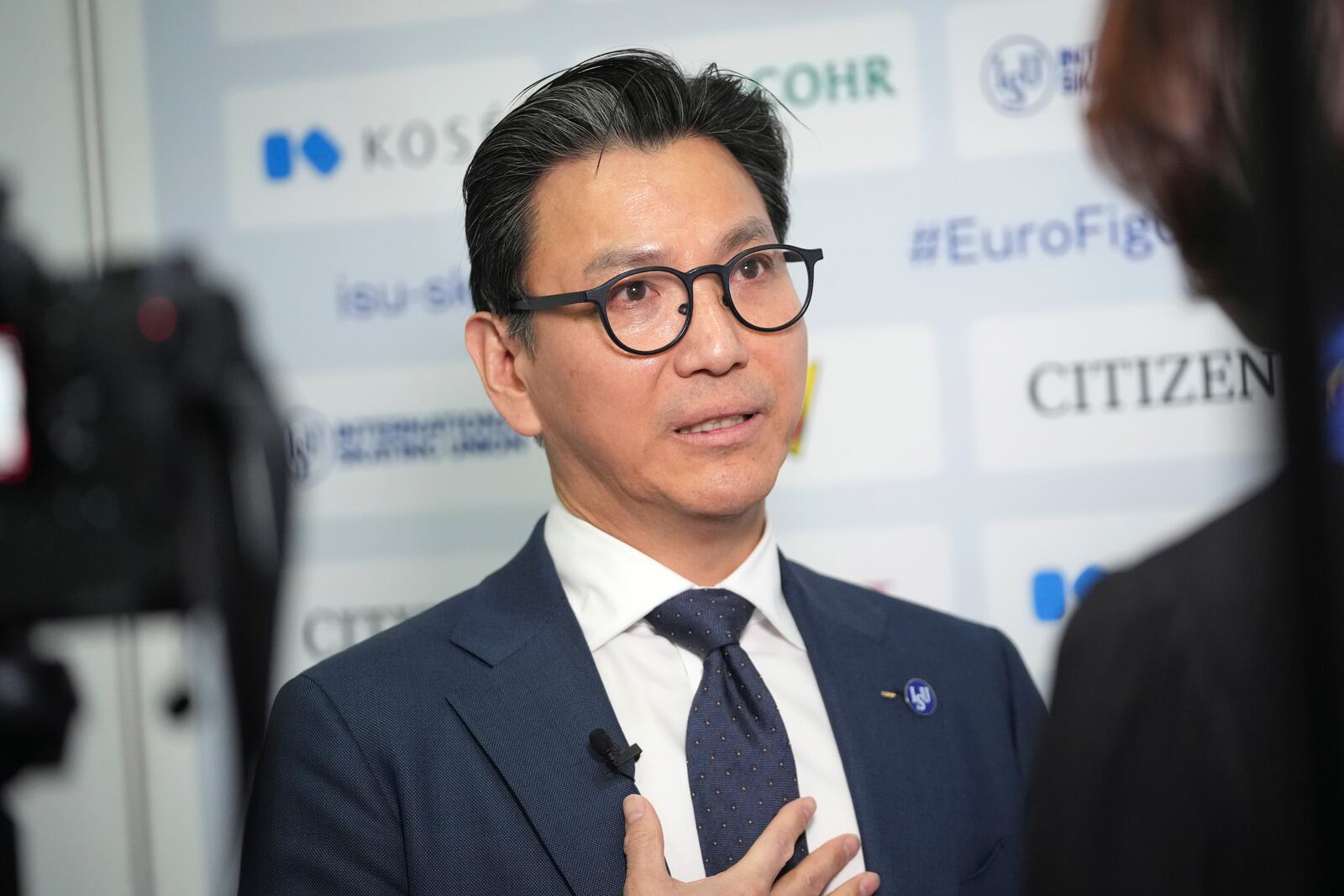 Jae Youl Kim, President of the International Skating Union, speaks during an interview for Associated Press during the ISU European Figure Skating Championships in Tallinn, Estonia, Friday, Jan. 31, 2025. (AP Photo/Sergei Grits)