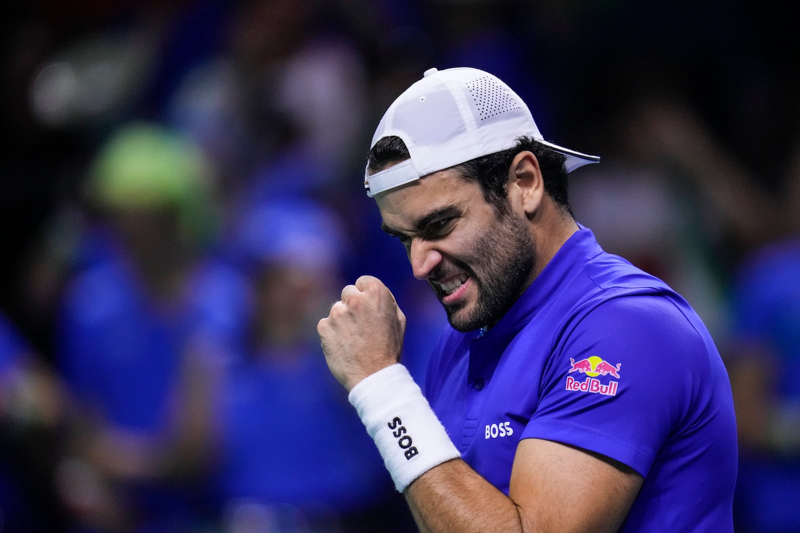 Italy's Matteo Berrettini celebrates a point against Netherlands' Botic van de Zandschulp during the Davis Cup final tennis match between Netherlands and Italy at the Martin Carpena Sports Hall in Malaga, southern Spain, on Sunday, Nov. 24, 2024. (AP Photo/Manu Fernandez)