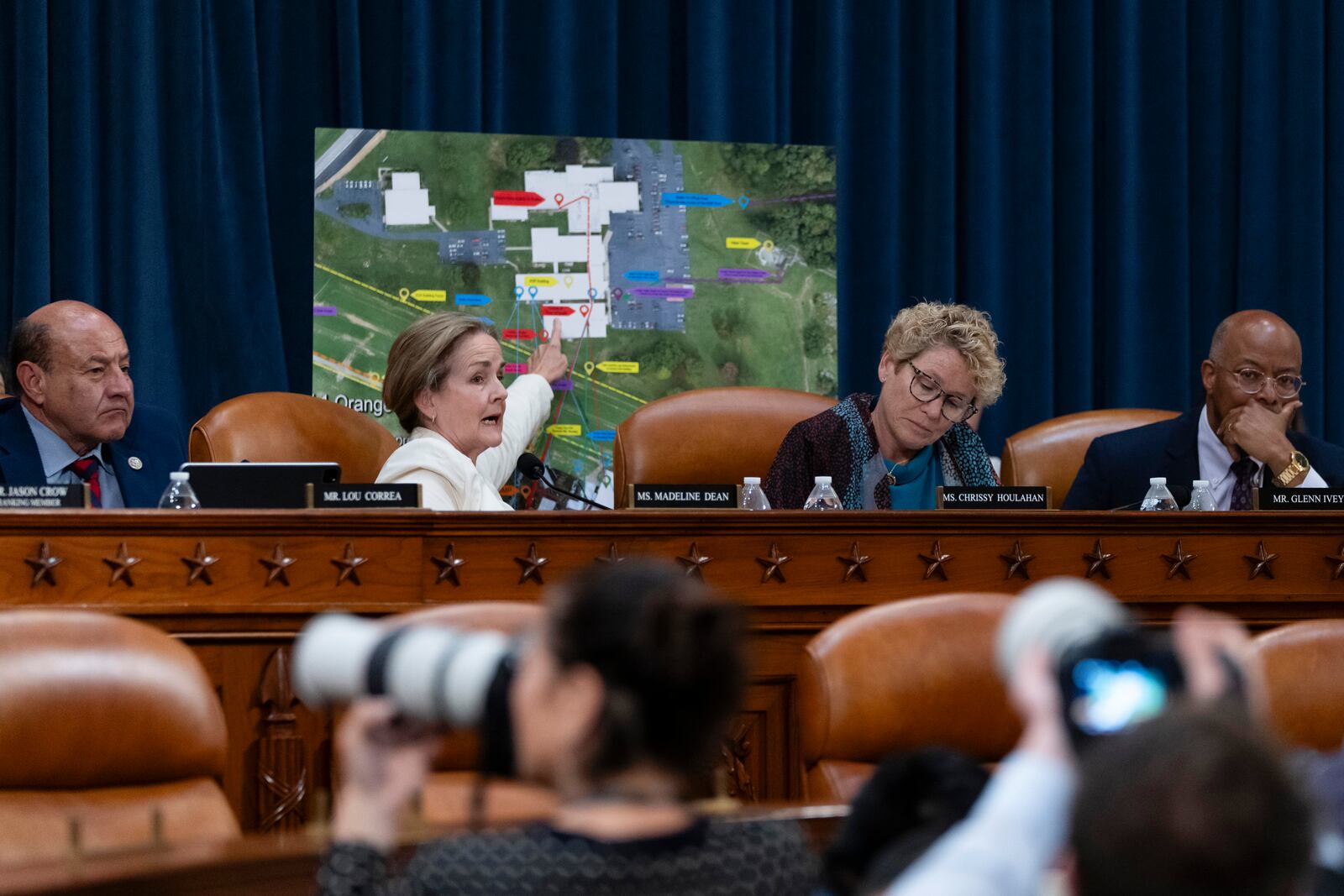 From left, Rep. Lou Correa, D-Calif., Rep. Madeleine Dean, D-Pa., Rep. Chrissy Houlahan, D-Pa., and Rep. Glenn Ivey, D-Md., ask questions in front of a site map at the first public hearing of a bipartisan congressional task force investigating the assassination attempts against Republican presidential nominee former President Donald Trump, at Capitol Hill in Washington, Thursday, Sept. 26, 2024. (AP Photo/Ben Curtis)