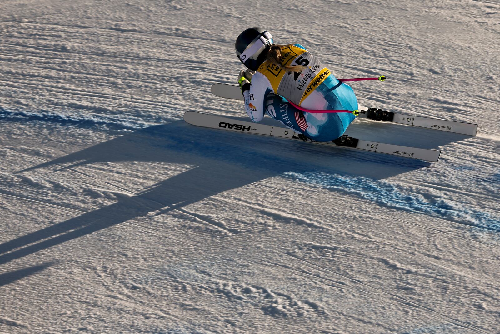 United States' Lindsey Vonn speeds down the course during a women's downhill training, at the Alpine Ski World Championships, in Saalbach-Hinterglemm, Austria, Wednesday, Feb. 5, 2025. (AP Photo/Marco Trovati)