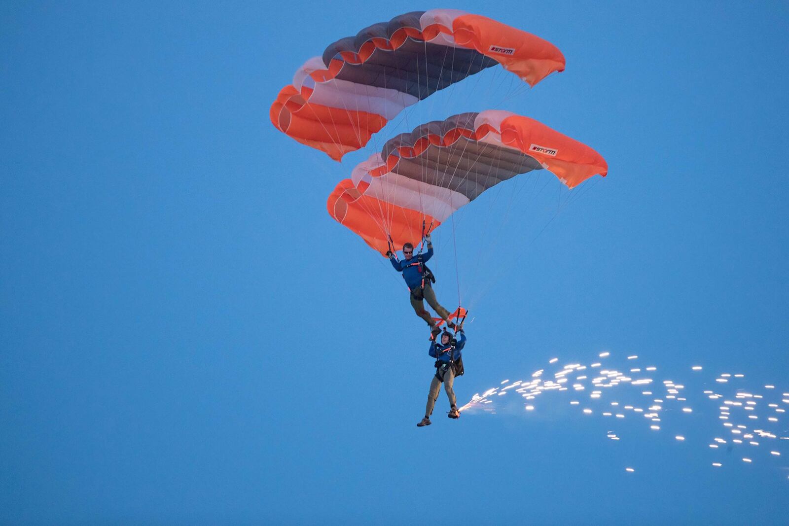 Nicole Condrey (bottom), Middletown's mayor and professional skydiver is shown in a maneuver with her late husband, Ron.