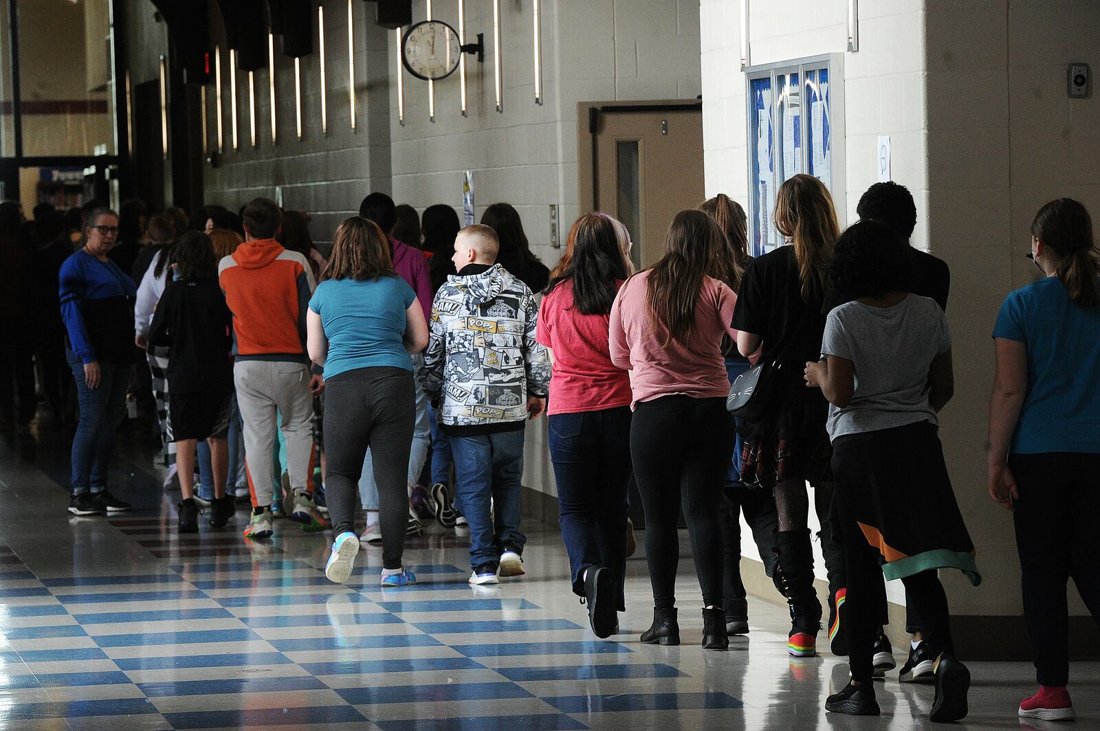 File - Students at Miamisburg Middle School walk through the hallways on May 5, 2022. Montgomery County will be expanding its access to intensive home-based behavioral health treatment for children after the Ohio Department of Medicaid announced additional grant funding in May 2024. This type of treatment helps children in settings they are familiar with, such as home or school, to treat mental or emotional health problems that are disrupting their day-to-day functioning. MARSHALL GORBY\STAFF FILE