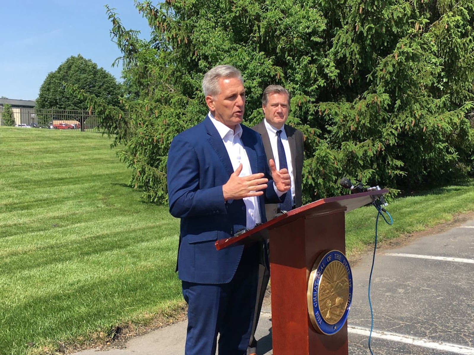 House GOP Leader Kevin McCarthy, at the podium, with U.S. Rep. Mike Turner, R-Dayton, Tuesday at the Hope Hotel, Wright-Patterson Air Force Base. THOMAS GNAU/STAFF