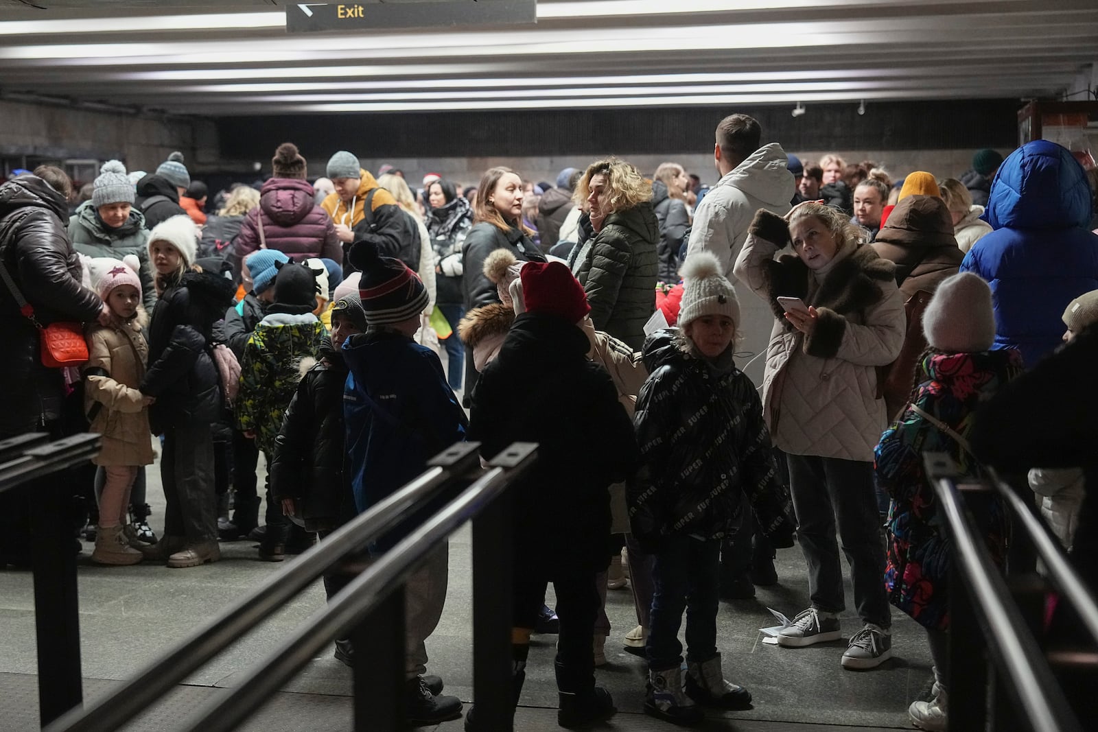 People take shelter in a metro station during and air raid alarm in Kyiv, Ukraine, Friday, Dec. 20, 2024. (AP Photo/Efrem Lukatsky)