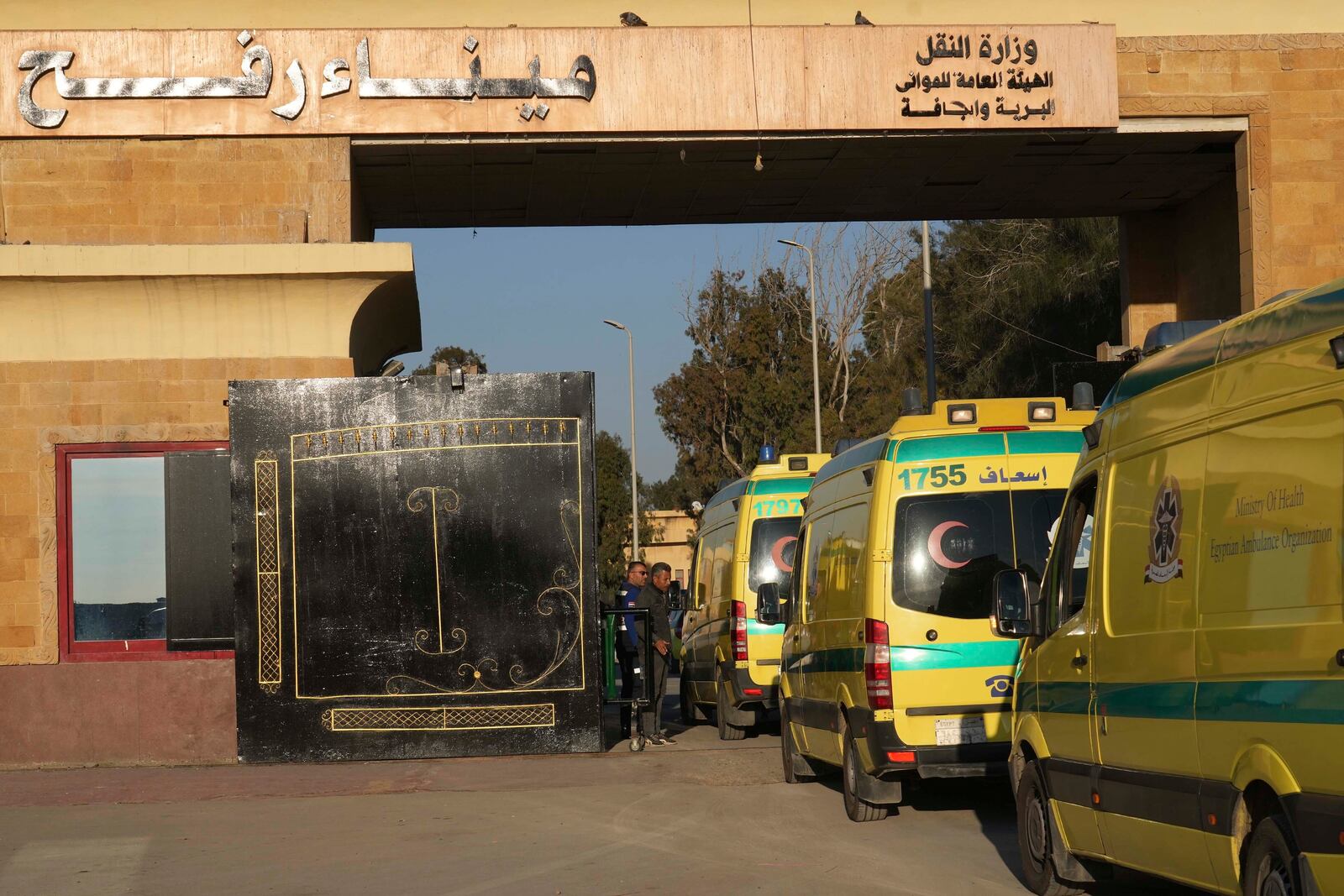 Egyptian ambulances cross the Rafah border crossing in Egypt, Saturday, Feb. 1, 2025. (AP Photo/Amr Nabil)