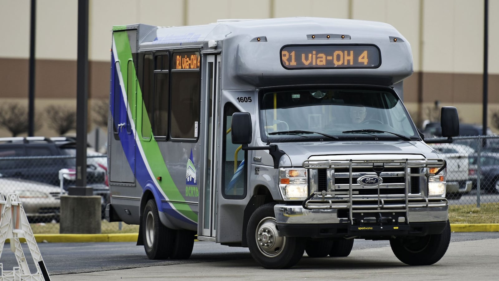 A Butler County Regional Transit Authority bus makes a stop Jan. 19 at the Kohl’s Distribution Center in Monroe. Discussions are underway among Middletown, Monroe and BCRTA about extending express bus service to the Dayton RTA South Dayton bus hub. NICK GRAHAM/STAFF