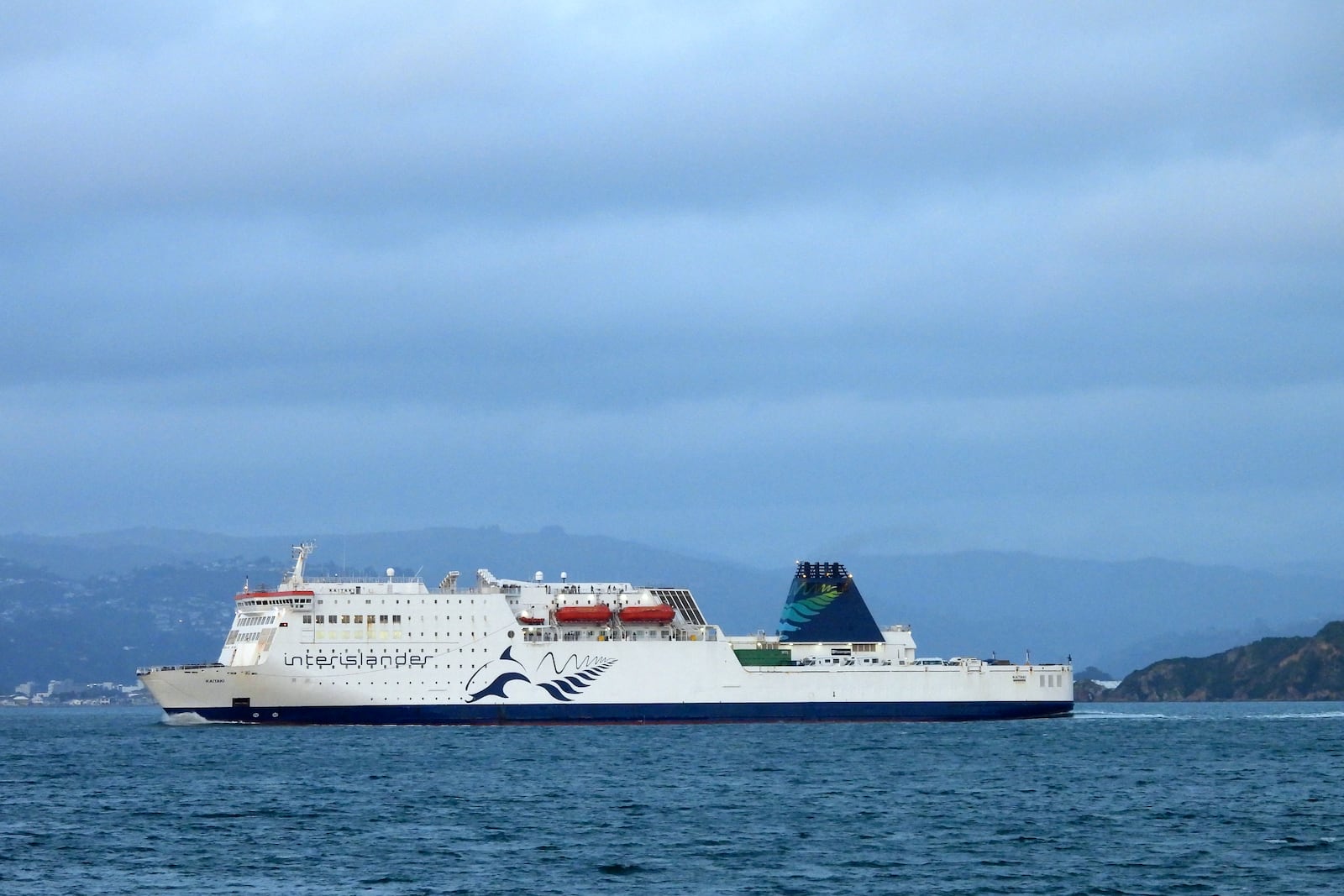 An Interislander ferry arrives in Wellington harbor, New Zealand, on Tuesday, Jan. 7, 2025. (AP Photo/Charlotte Graham-McLay)