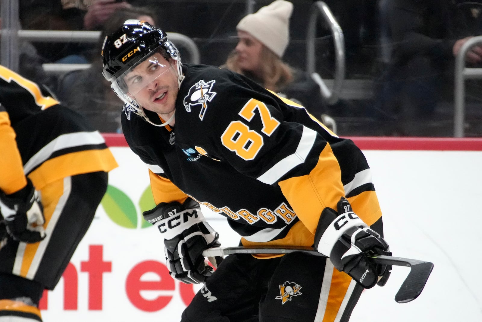 Pittsburgh Penguins' Sidney Crosby prepares to take a face-off during the second period of an NHL hockey game against the Columbus Blue Jackets in Pittsburgh, Tuesday, Jan. 7, 2025. (AP Photo/Gene J. Puskar)