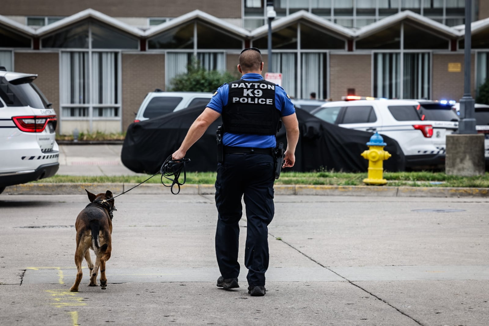 Dayton police are investigating a shooting at Park Manor apartment complex late Wednesday morning on June, 26, 2024. JIM NOELKER / STAFF